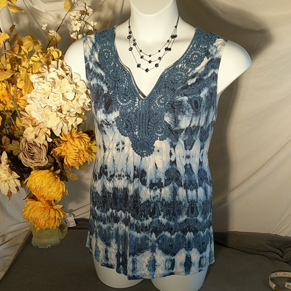 Blue and white sleeveless shirt